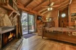 King master bedroom with romantic wood burning fireplace